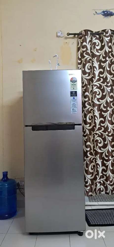 3 years old, Samsung  ( gross volume 253 Ltr/ Storage volume 234 Ltr .