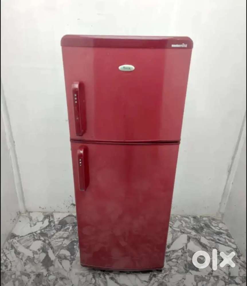 Whirlpool double door meroon colour refridgerator.          Opliyungh