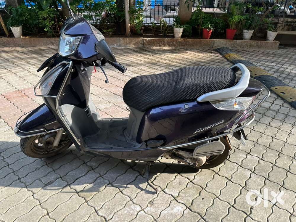 Purple colour in excellent condition. Less km run