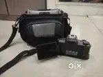 Canon EOS M50 Mark II Mirrorless Camera along with 18-55mm kit lens
