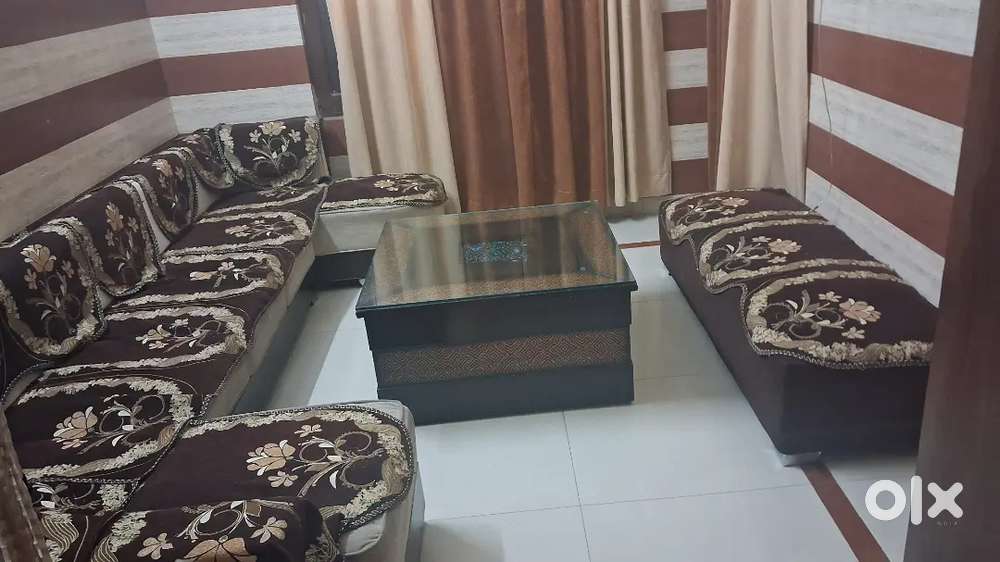 9 seated sofa with luxury table