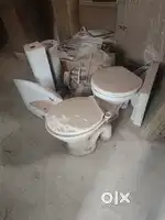 Western toilet and standing washbasin