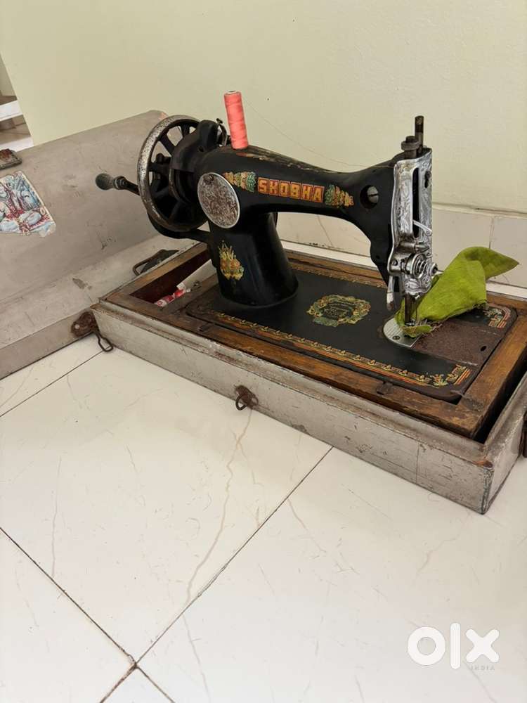 Sewing machine- working condition with cover and stand