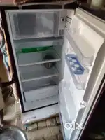 Single door fridge urgent sale 2 week old Whirlpool okay and fresh