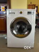 Godrej front loading  machine, 6 kg capacity.