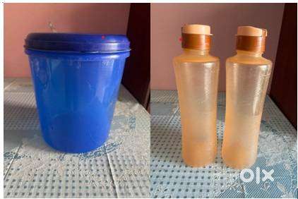 Both 2 plastic New bottles and 1 blue used container for sale price