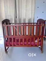 Babyhug florence wodeen cot cum rocker with babyhug mattress