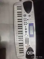 Casio with adaptor 22 00