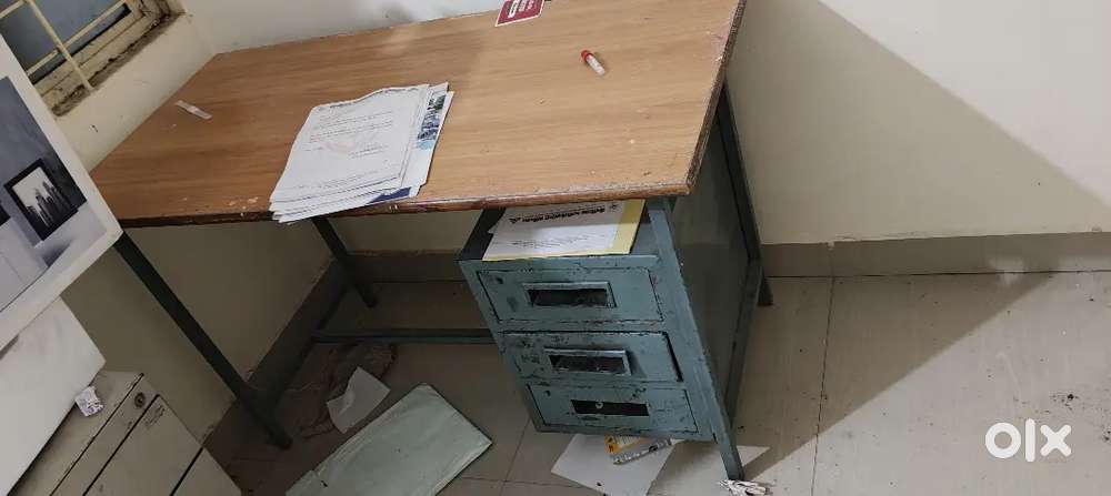 One office table , one doctor examination table,one matal rack,chairs