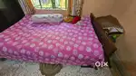 Wooden single bed