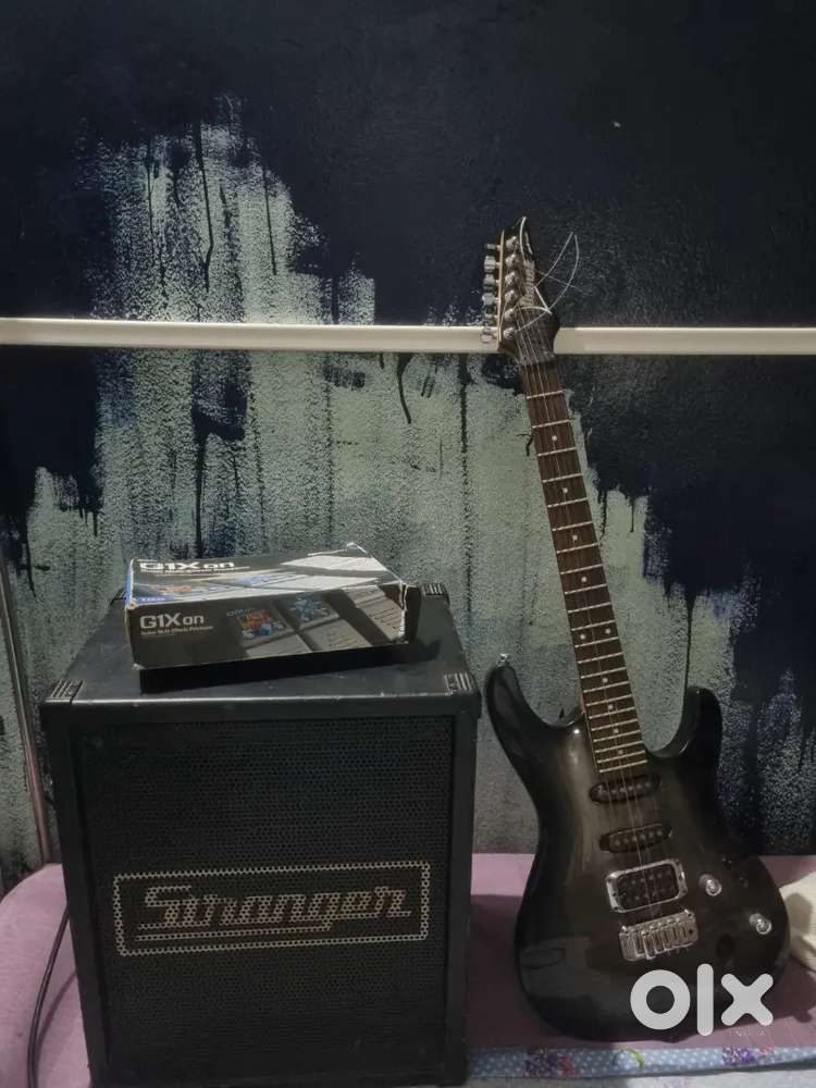 Electric guitar + amplifier + effect