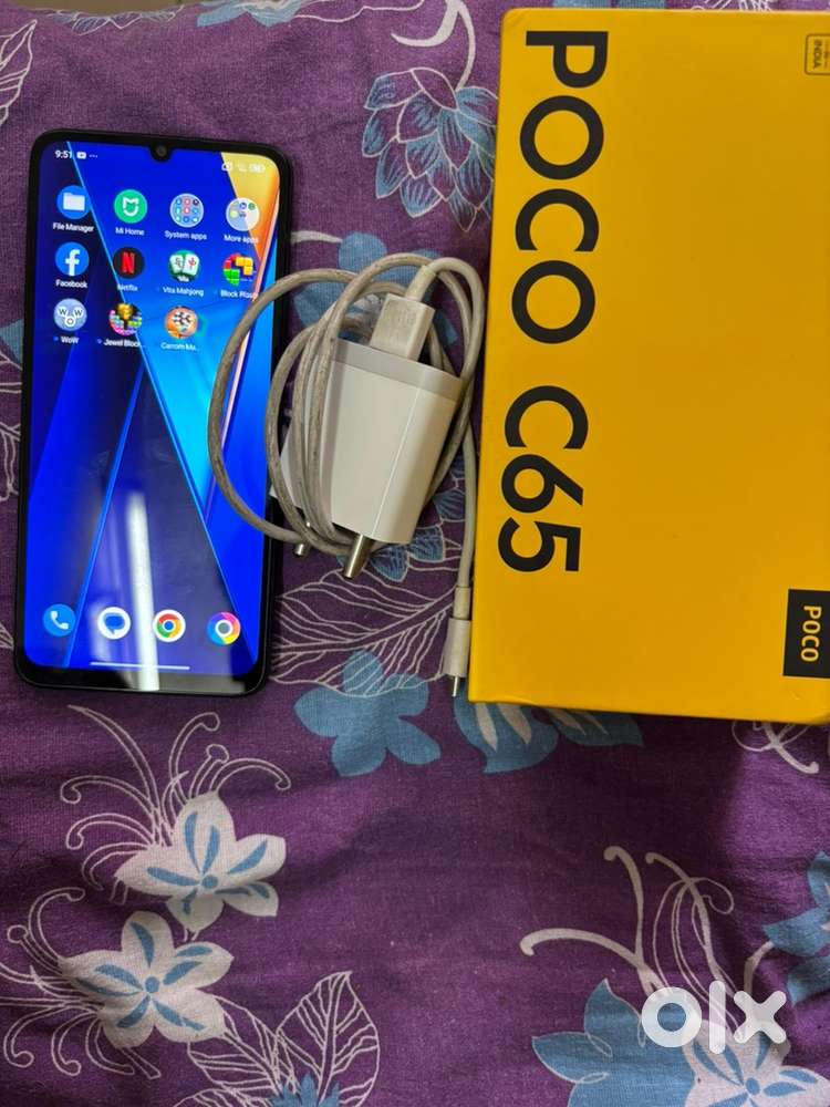 Poco c65 with 6 gb ram and 128 gb storage . Black in colour