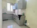 2 bhk Airy apartment with cupboards, modular kitchen, fans, lights etc