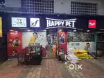 Sales lady in pet food shop
