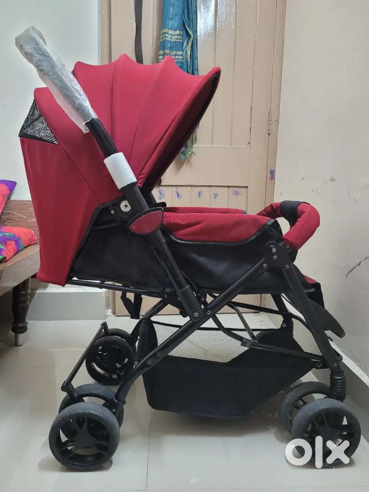 Babyhug  tricycle stroller with canopy and storage