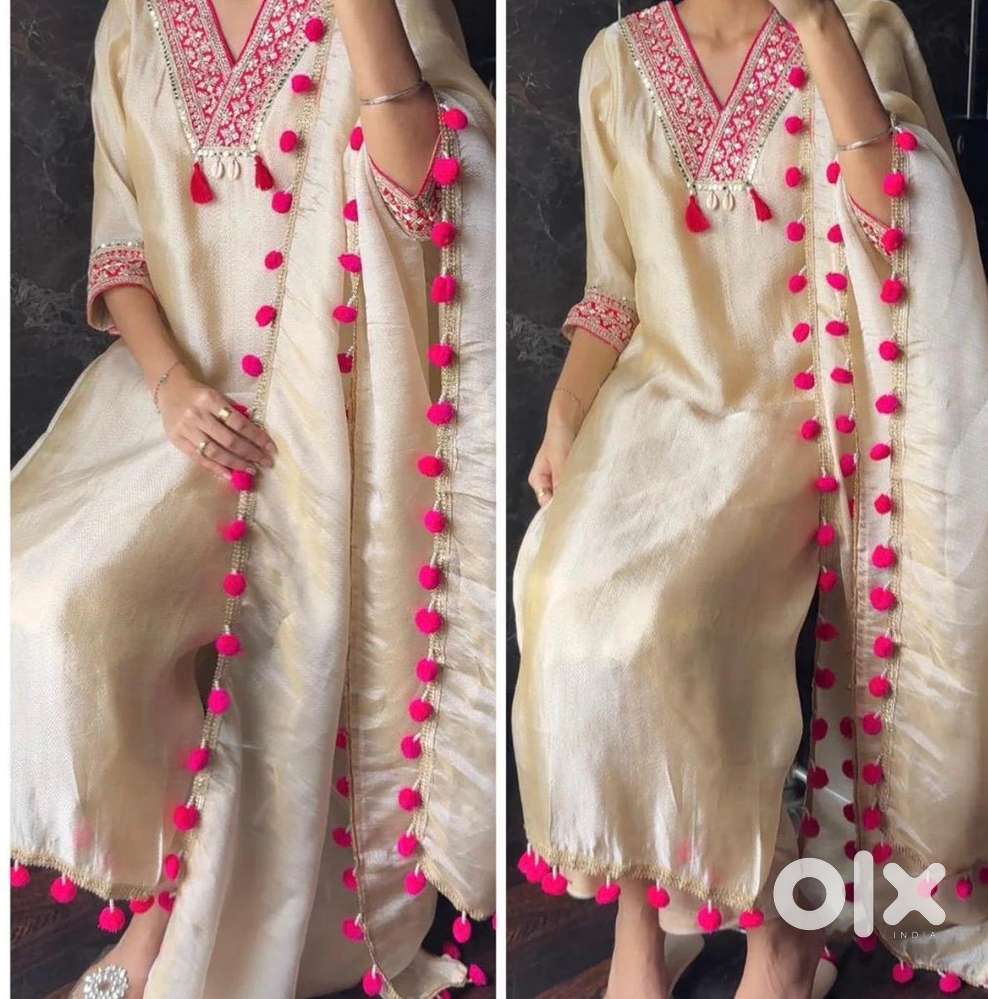 Ivory tissue pom pom suit