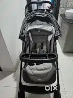 Global brand sparingly used Baby Stroller with Car Seat (air bag)