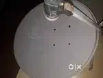 old lg tv with set top box and dish antenna