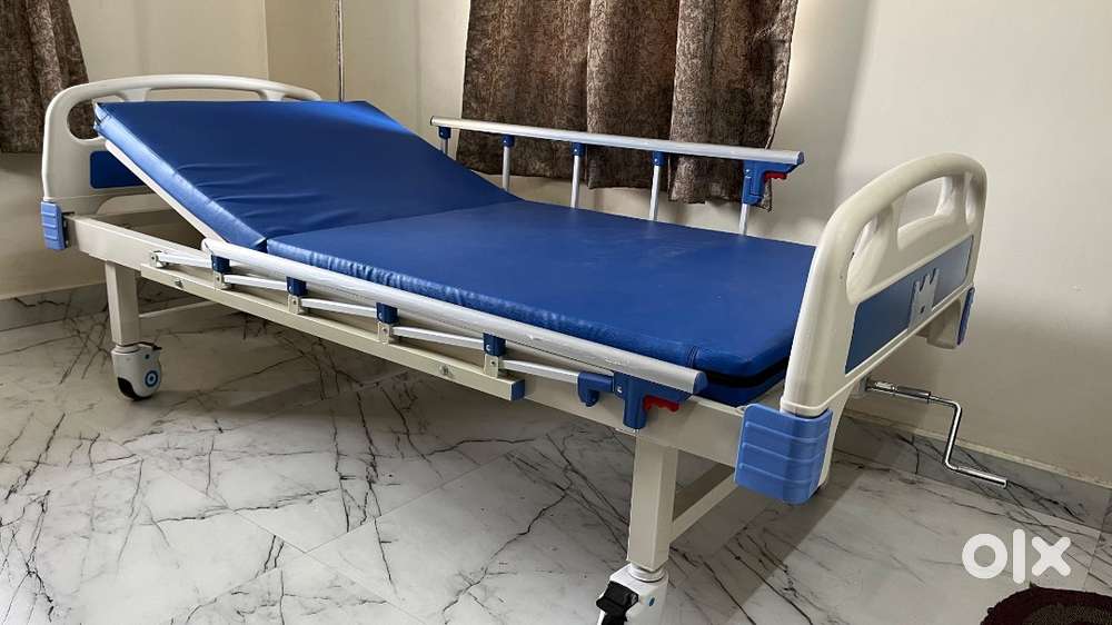 Hospital cot with bed