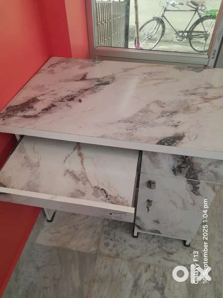 One white marbel table new...unused tabel (made one week ago)