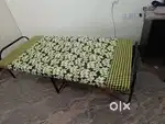 Foldable metal bed with mattress