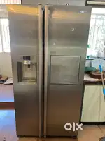 Samsung 702L Side by Side Refrigerator with Water and Ice Dispenser