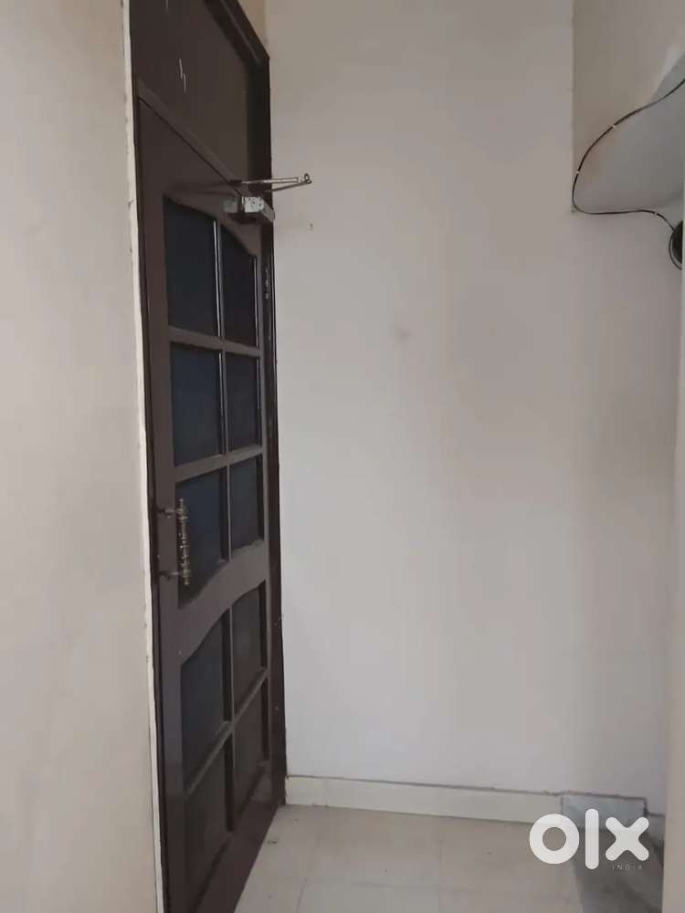 2 BHK semi furnished but with bed, fans furniture