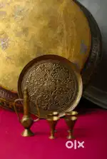 A handcrafted brass miniature surahi with glasses