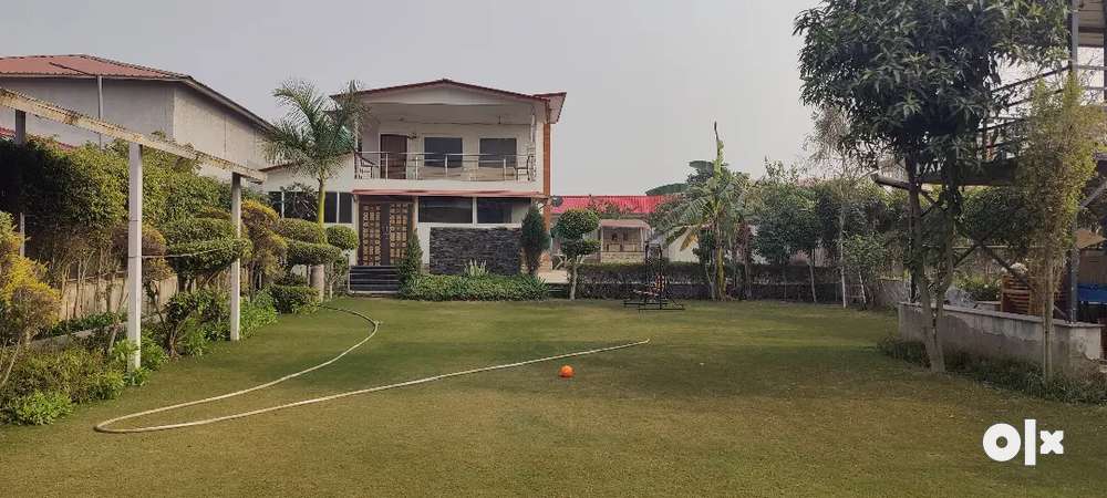 Farm house for sale in a developed society in Noida