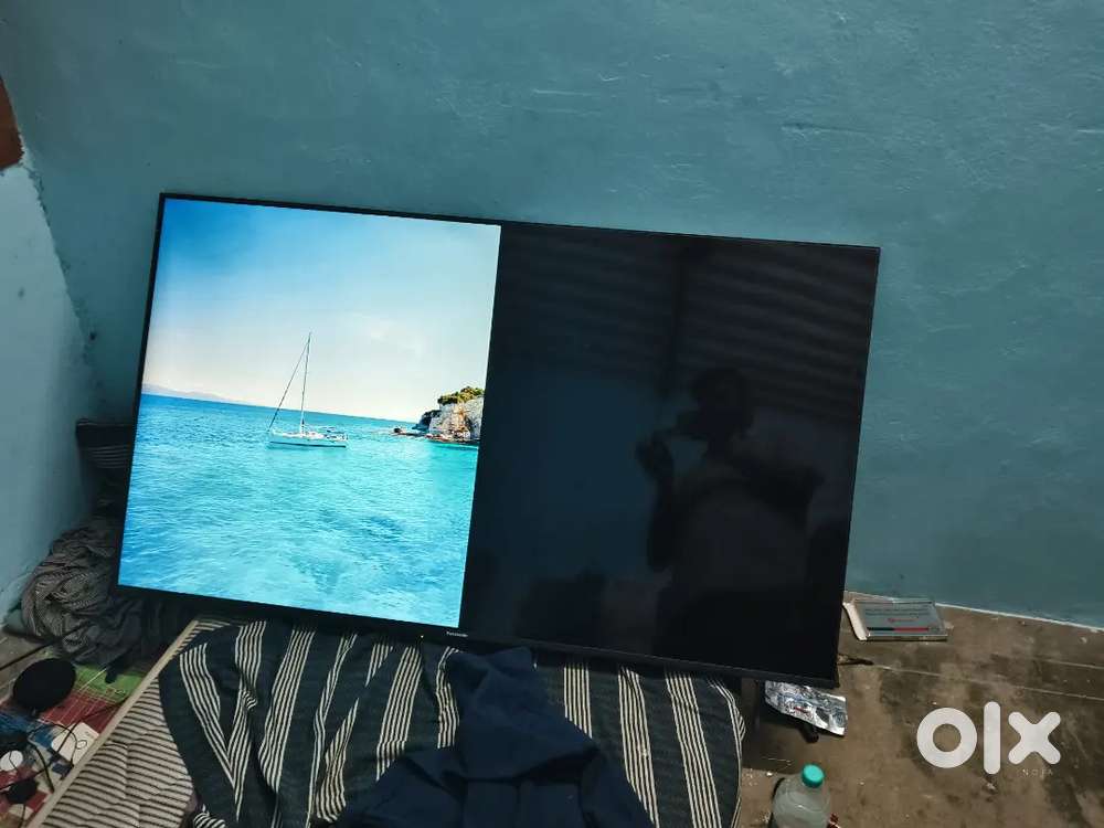 Panasonic led tv 55 half screen working