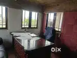 Well furnished office with sofa chairs and Big table