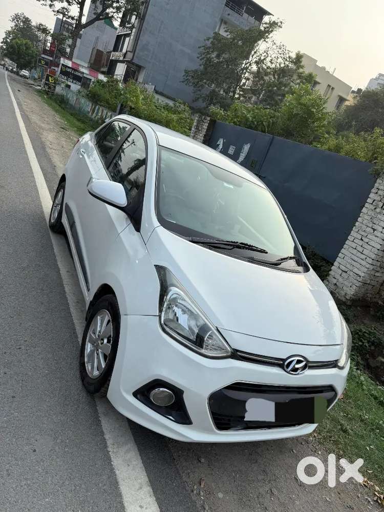 Hyundai Xcent 2016 Diesel with new seat covers