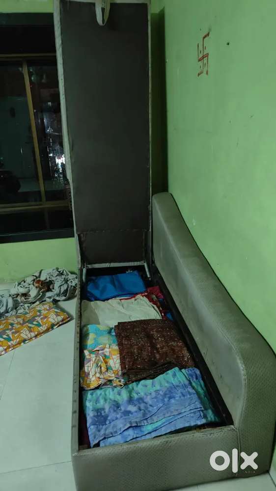 Sofa cum bed with storage
