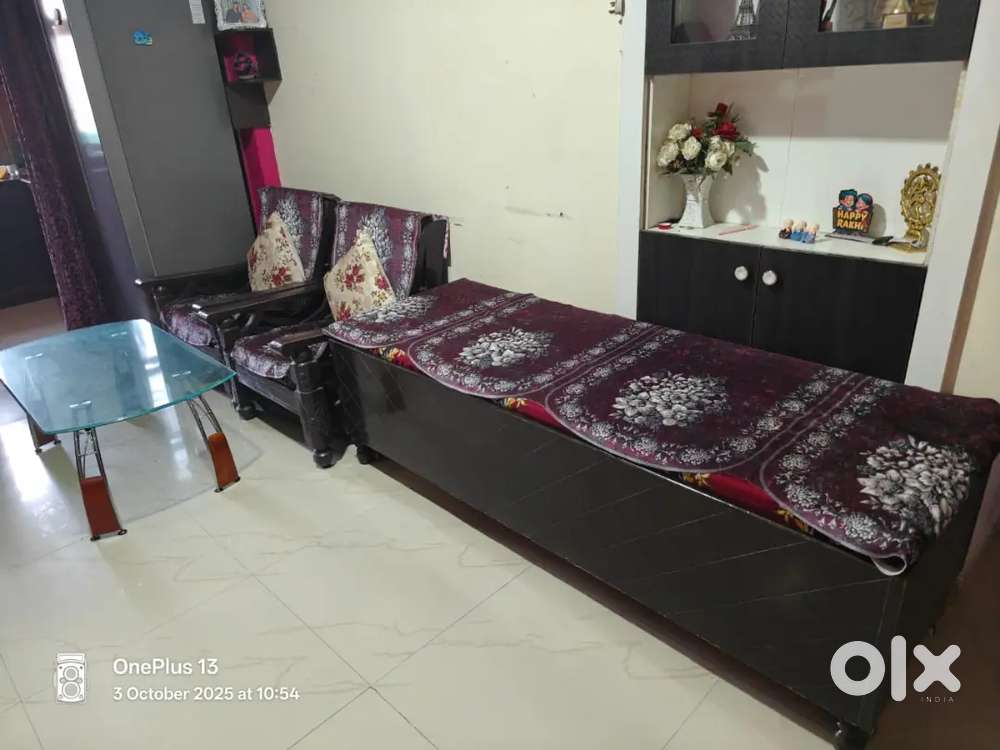 Wooden sofa and diwan with glass table