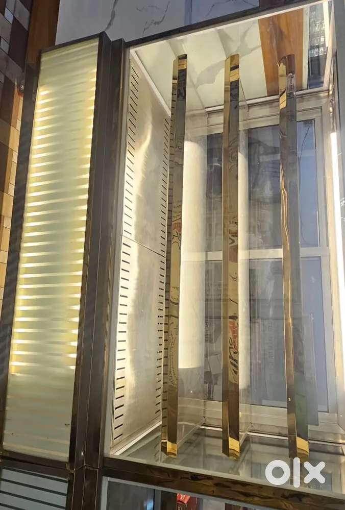 1 ac and non ac both in one sweet display counter .