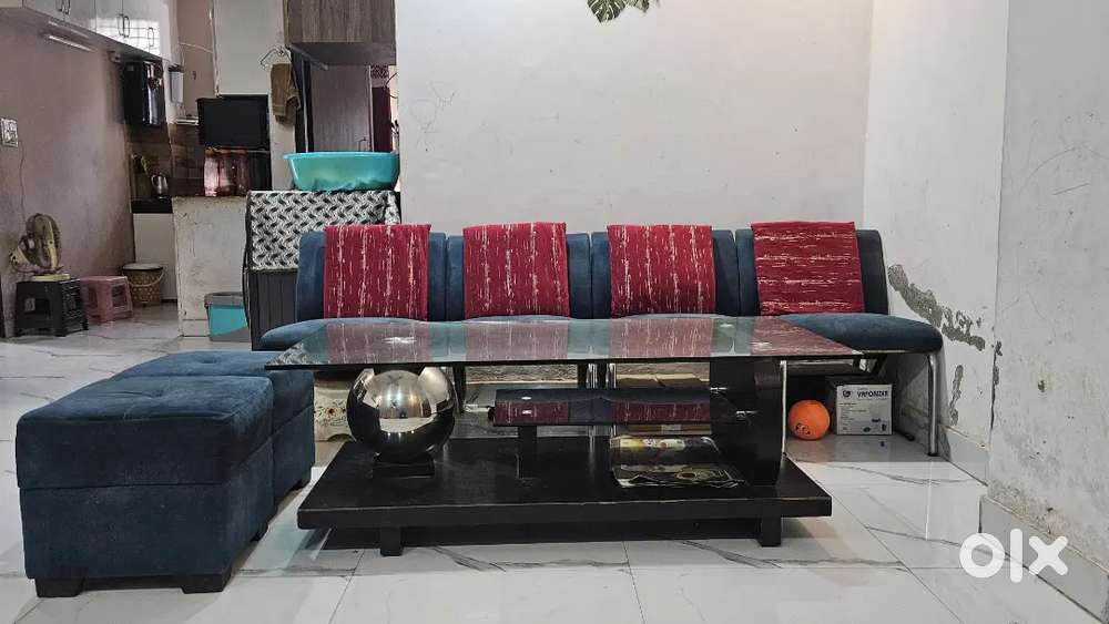 steel frame sofa, toughned glass center table and 2 puffies