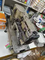 Kaj button machine