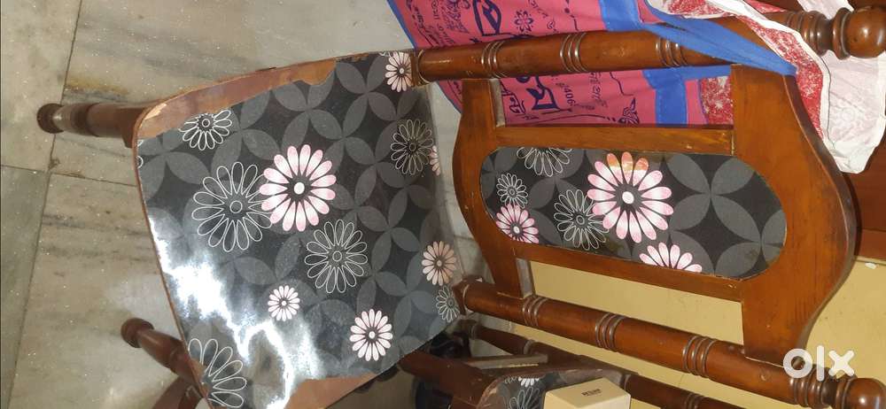 4seater segun dining table with round top ,totally wooden.