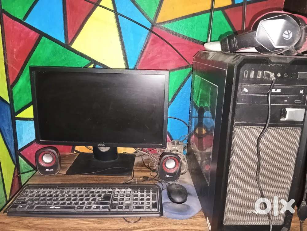 Computer with speaker and headphones