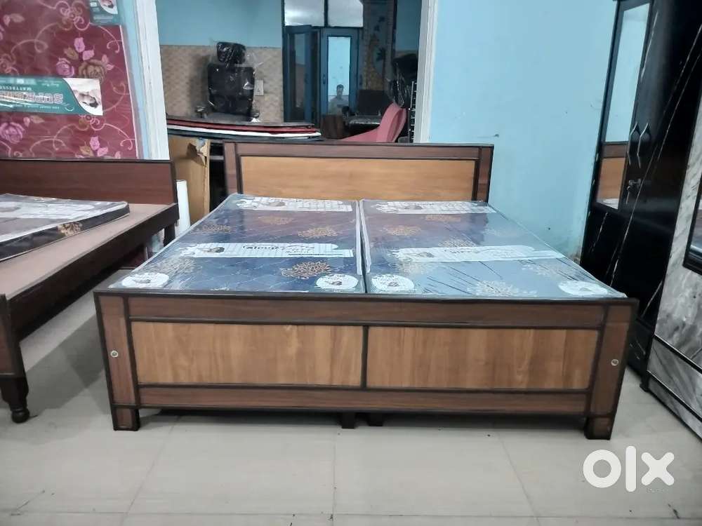 Storage wooden double bed 6 by 6 ft new one availablek