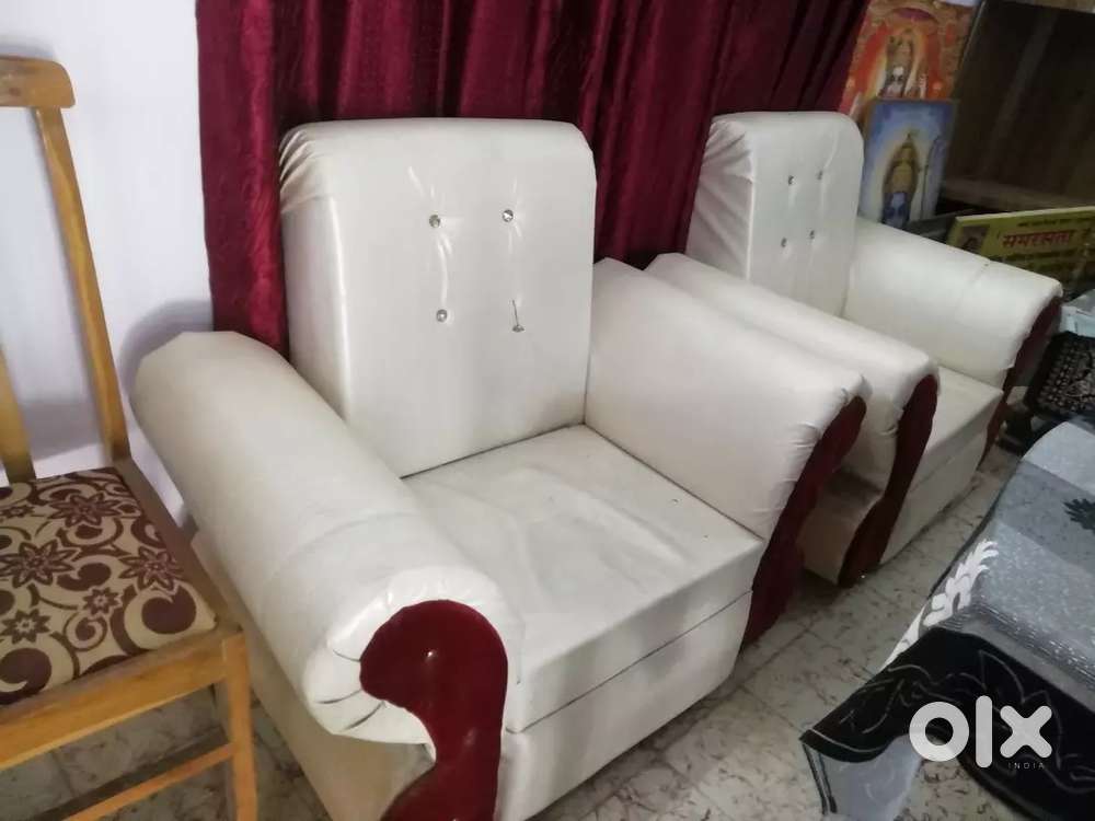 Sofa set of cream and maroon colours