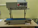 Vertical band sealer machine