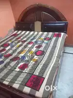 Double bed with gadde and aalmari