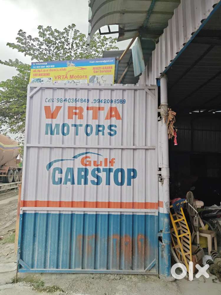 Car mechanic and helper