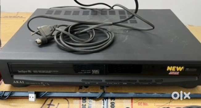 Old Akai Video Cassette recorder (VCR) with remote contol