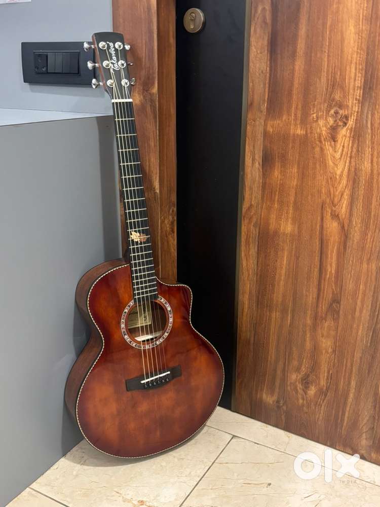 Guitar- Takawood (Brand New Condition)