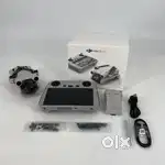 DJI Mini 3 Pro Drone Quadcopter w DJI RC
RM330 & 2x Batteries