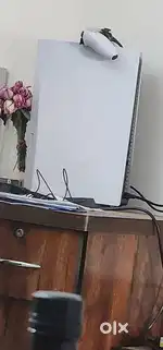 PS5 with console and two games