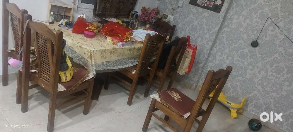 Dining table and pure metal almirah