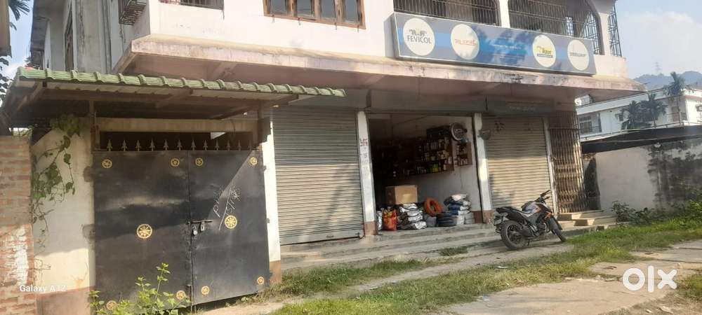 Plot with building for sale